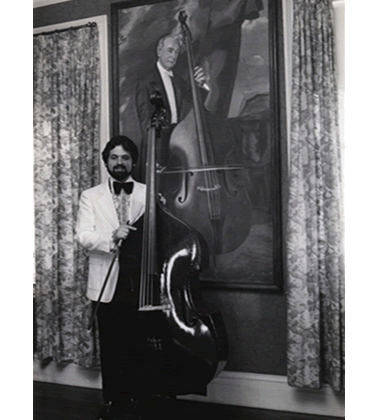 Gary Karr with painting of Serge Koussevitzky
